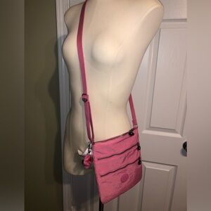 New pink with tag and monkey.